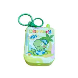 Cute cartoon dinosaur toy keychain pendant, green plastic mini game machine backpack charm.