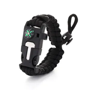 Bracelet de survie en paracorde noire avec boussole et boucle multifonction pour extérieur.