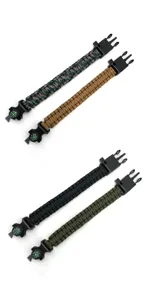 Outdoor survival paracord bracelet with compass and whistle, multi-functional tactical gear.
