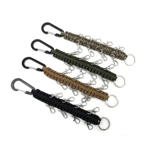 Multi-functional paracord keychains with carabiners and multiple clasps in four colors.