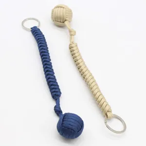 Kit de porte-clés poing de singe en paracorde, corde de survie solide avec anneau en métal.