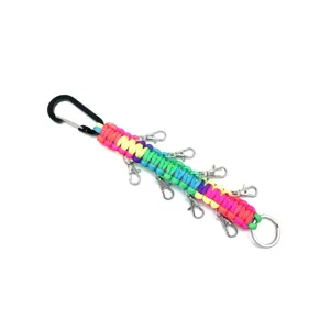 Detailed view of the colorful paracord keychain featuring multiple metal clasps and carabiner.