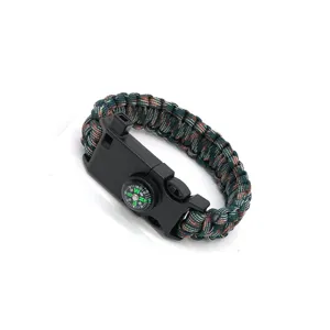 Outdoor survival paracord bracelet detail showing sturdy 7-core weave and integrated compass buckle.