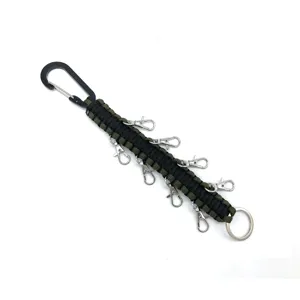 Multi-functional paracord keychain with carabiner and multiple lobster clasps for outdoor use.