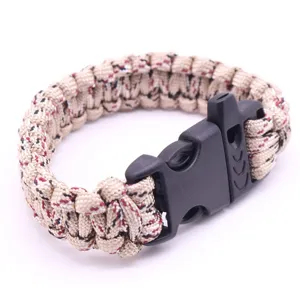Survival paracord bracelet with whistle, woven 7-core outdoor emergency wrist strap gear.