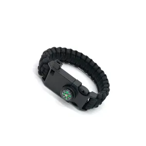 Black paracord survival bracelet with whistle and compass for outdoor adventure and hiking.