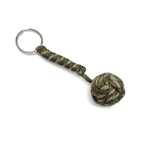 Paracord keychain pendant, miniature woven monkey fist ball design with metal ring.