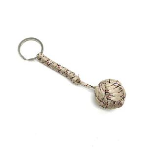 Outdoor paracord woven keychain monkey fist pendant mini seven-core nylon rope key ring detail.