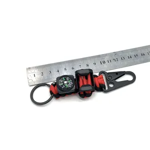 Paracord keychain with compass and snap hook, survival tactical lanyard detailed view.