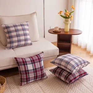 Cozy plaid throw pillow cover for living room sofa decoration and comfortable home styling details.