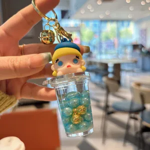 Simpatico portachiavi a tazza di bubble tea con olio e perline glitterate fluttuanti.