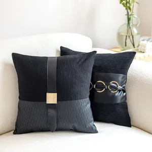 Black leather decorative throw pillow cover with chic metal buckle accent, sofa cushion.