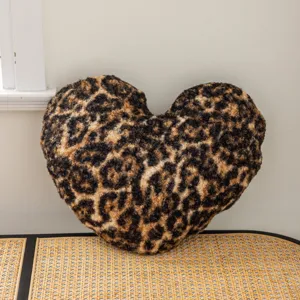 Leopard print heart shaped plush pillowcase, cozy fleece cushion cover for sofa bed home decor.
