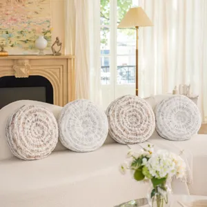 Round decorative throw pillow with tree ring pattern for sofa and bedroom couch detail.