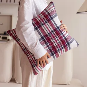 Detailed view of a classic plaid throw pillow cover, perfect for cozy sofa decor and room.