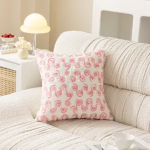 Pink rose plush pillowcase detail, soft decorative cushion cover for cozy home decor.