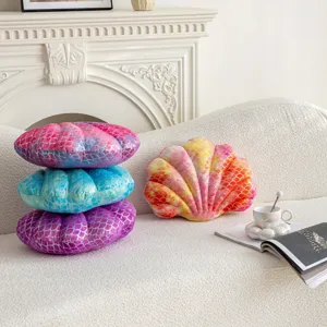 Cozy plush shell pillow detailed shot in a modern living room setting, soft home decor.