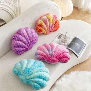 Soft plush shell pillow detail, gradient mermaid scales design, cozy sofa decor accent.