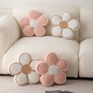 Soft plush flower throw pillow detail view, cozy home sofa decorative cushion for living room.