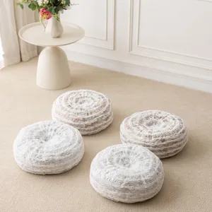 Round plush floor cushion detailed view, gold and silver tree ring pattern throw pillow
