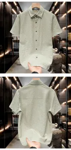 Detailed view of men's sage green textured short sleeve shirt, showcasing the fabric and fit.