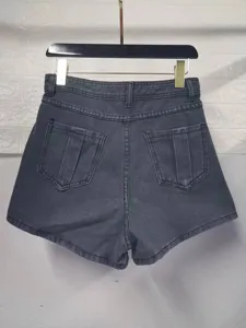 Rear detail view of women high waist dark gray denim shorts casual streetwear style.