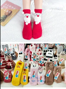 Cozy winter fuzzy floor socks with cute cartoon animal designs, soft coral fleece sleep socks.