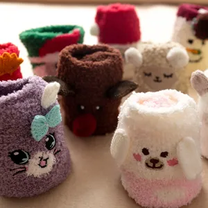Cozy fuzzy winter floor socks with cute cartoon animal designs for warm indoor home wear.