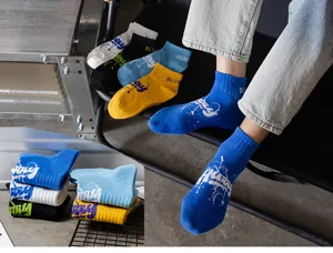 Men's fashion short socks with cool graffiti print and comfortable cotton fabric for daily wear.