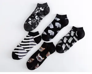 Men low cut boat socks detail view, showing multiple stylish patterns like cat and stripes.