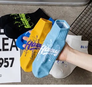 Trendy men's short cotton socks with graffiti prints, stylish and comfortable casual wear.