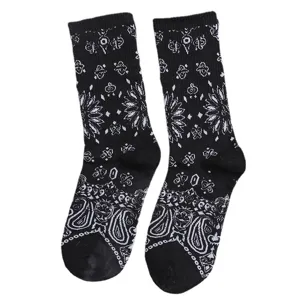 Black and white paisley pattern mid tube crew socks for men and women street style cotton.