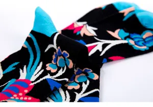 Men's stylish long cotton socks with colorful floral and magpie pattern for daily wear.