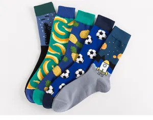 Trendy men's patterned long socks featuring fun rocket, banana, and soccer ball illustrations.