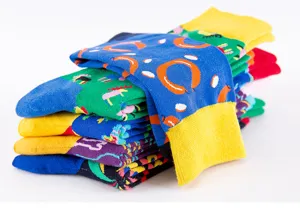 Colorful patterned cotton crew socks detail view, comfortable four-season fashion wear for men.