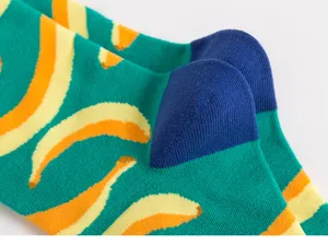 Men's green banana pattern long socks, stylish casual athletic skateboard crew socks.