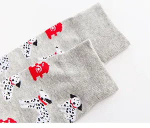 Detailed view of men's cotton socks featuring cute dalmatian dog patterns for spring wear.