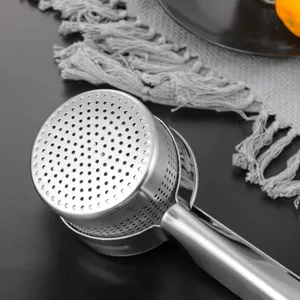Stainless steel potato masher with dense filter holes, durable kitchen tool for effortless mashing.