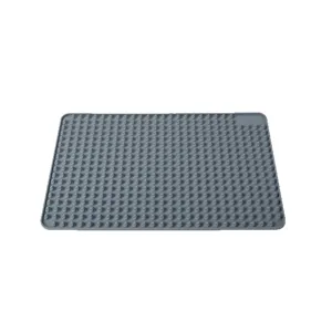 Graue Silikon Hitzeschutzmatte für Mikrowelle Küche und rutschfeste Backofenunterlage.