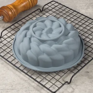 Stampo per ciambella in silicone grigio, teglia resistente al calore per mousse e dolci da forno.