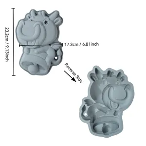 Grey silicone baking mold with cute cartoon ox design, perfect for cakes and DIY craft projects.