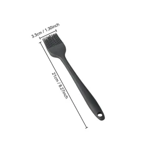 Black silicone basting brush for kitchen baking and BBQ, 21cm long with hanging hole design.