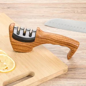 Close-up detail of the portable wooden grain knife sharpener featuring multi-slot sharpening design.