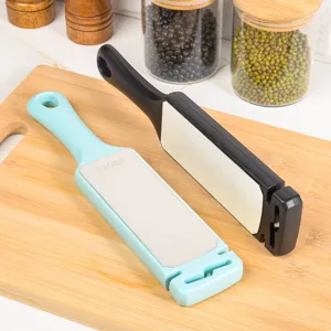 Double-sided diamond knife sharpener with ergonomic handle, quick kitchen tool for home use.
