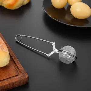 Stainless steel tea infuser detail shot, 4.5cm mesh ball with wire handle for loose tea brewing.
