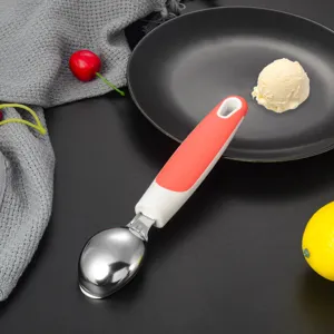 Stainless steel ice cream scoop detail, durable metal tool for home baking and dessert serving.