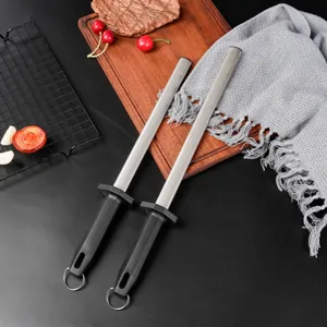 Handheld diamond knife sharpener detail, durable kitchen tool for fast household blade sharpening.