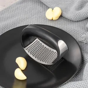 Stainless steel ergonomic rocking garlic press kitchen tool with black handle for home cooking