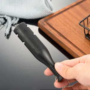Portable mini tungsten steel knife sharpener, outdoor multi-functional tool detail view.