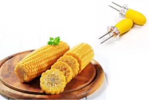 Stainless steel corn cob holders with bright yellow ergonomic handles and clear safety guards for BBQ.